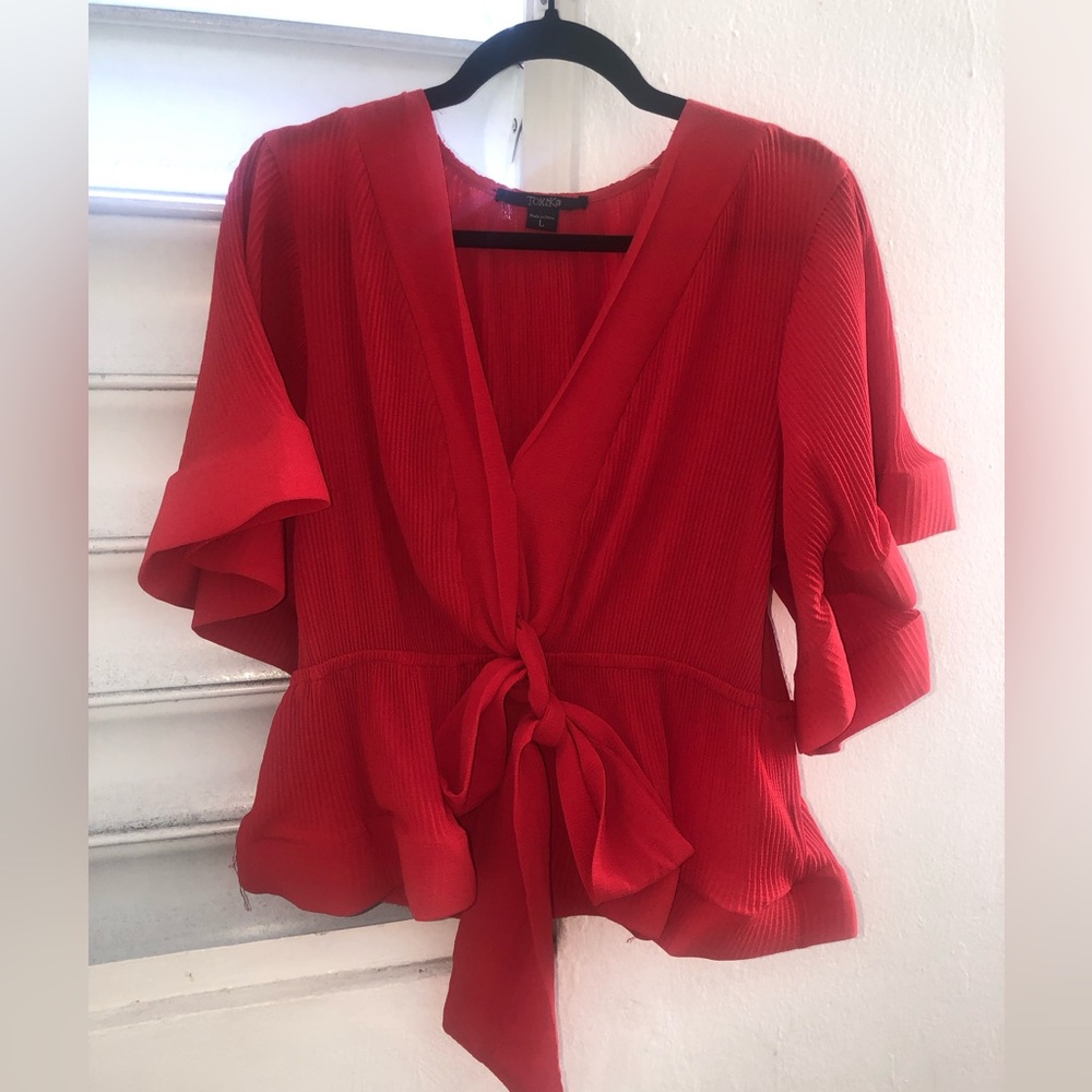 Red flared top